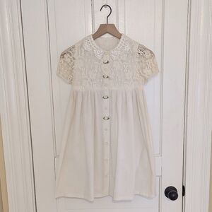 Vintage cream dress with lace top and flower coverd buttons size 10